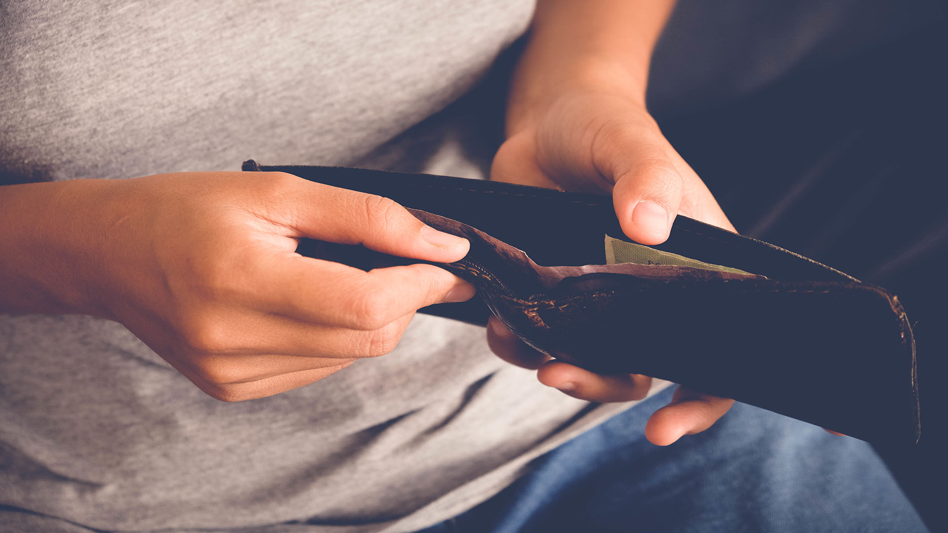 save money for investment concept women hold a wallet with filte